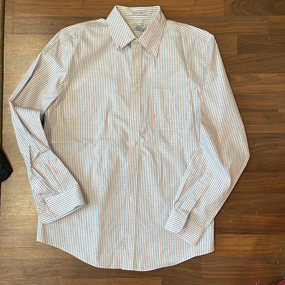 Plaid, red and blue striped pattern, long sleeve button up collared shirt